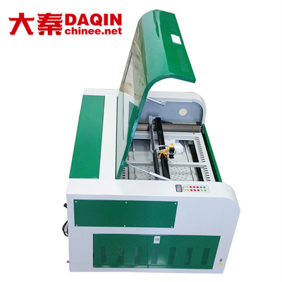 Máquina cortada con tintas de encargo de cristal moderada de la etiqueta engomada 30W, máquina de 30kg Daqin