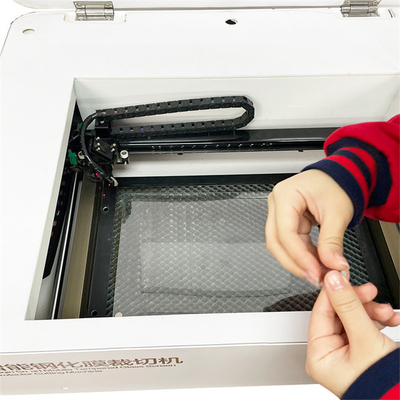 Pequeños negocios en el hogar Corte de nano vidrio Cnc Cutter Acrílico Certificación CE Mini portátil máquina de grabado con láser