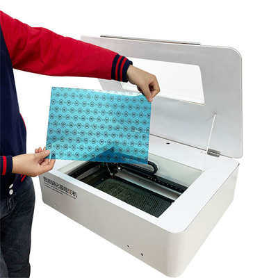 Cortado por láser de pegatinas móviles personalizadas para papel cuero enfriamiento con agua Weihong Control Plotter automático de corte por láser